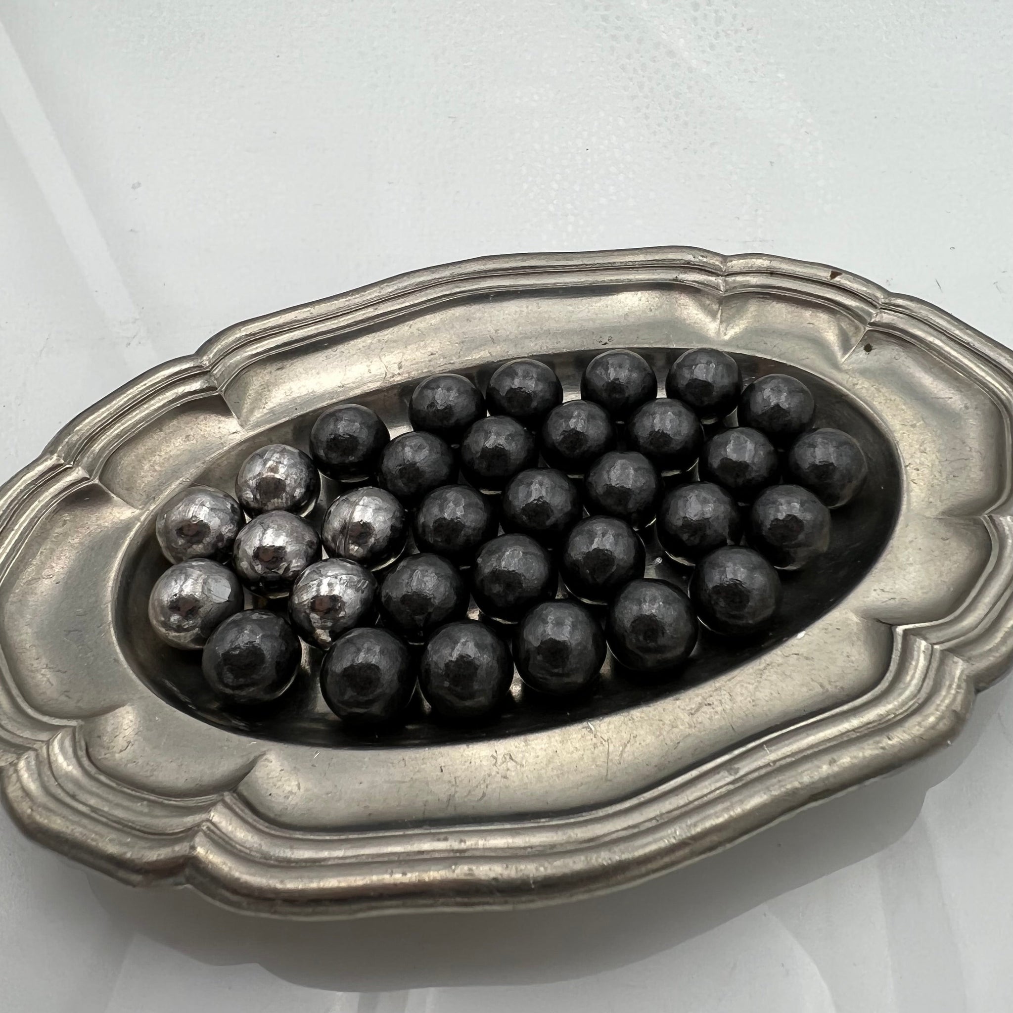 Cal.370 | Boule de plomb roulée