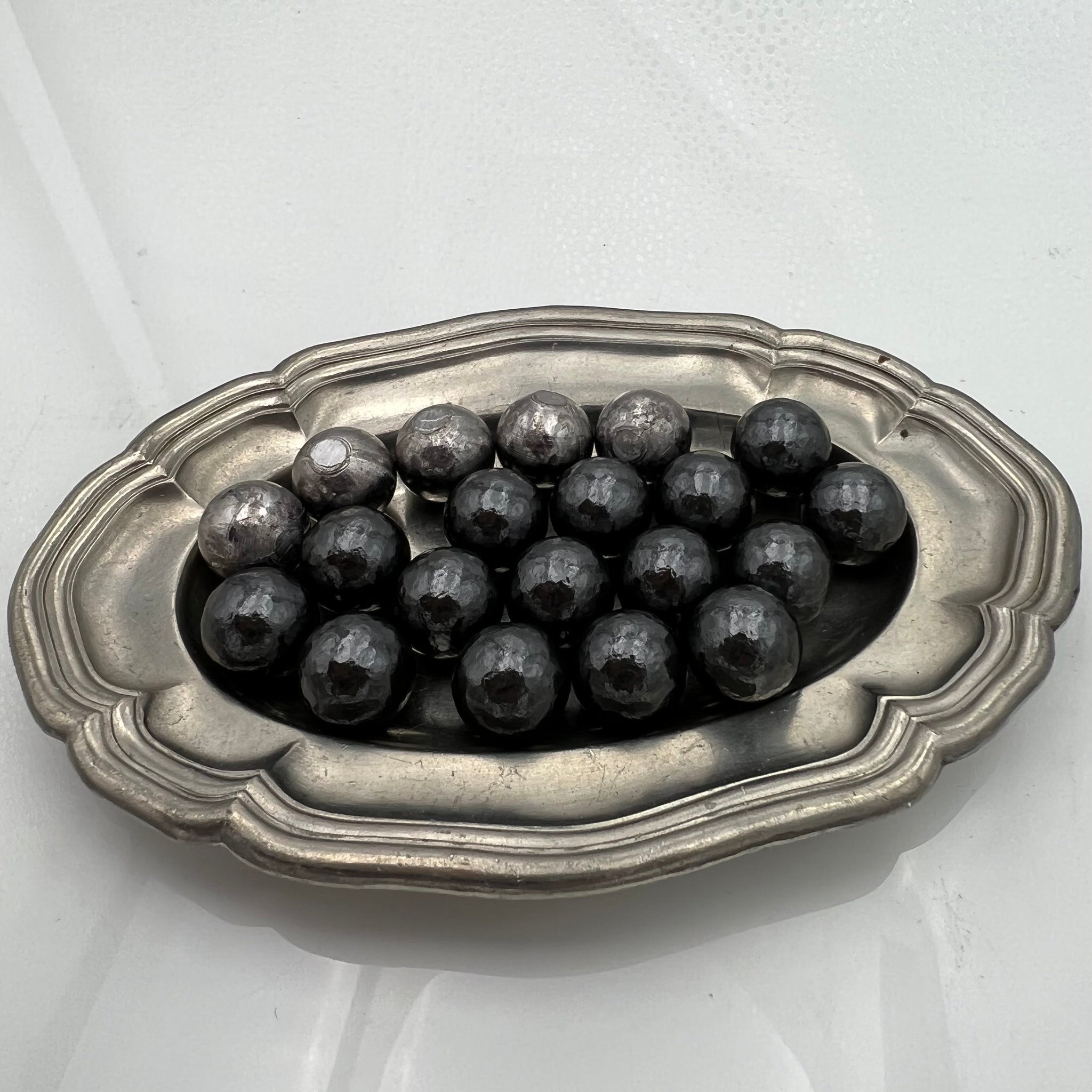 Cal.498 | Boule de plomb roulée